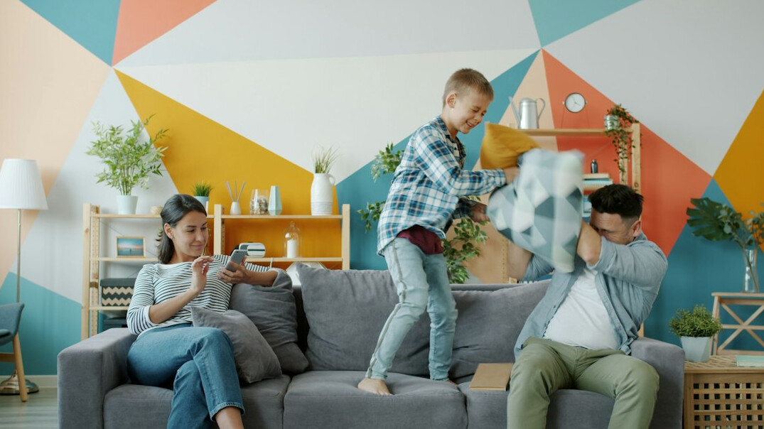 family using smart security camera